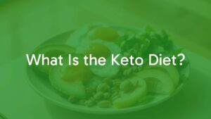 A healthy meal on a plate with avocados, eggs, nuts, and leafy greens, representing the keto diet, warm lighting, realistic.